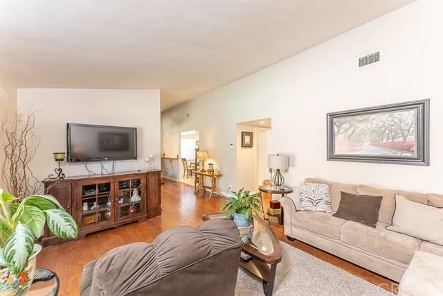 Living room with a beige sofa and brown armchair in California